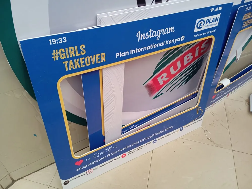 Large printed photo booth frames styled as a social media post, cut out and ready for an event
